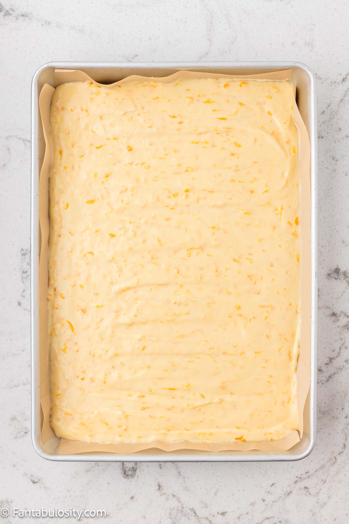 Cake batter poured in to 9x13 baking pan.
