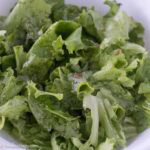 A bowl of wilted lettuce, that's leaf lettuce with bacon grease and salt.