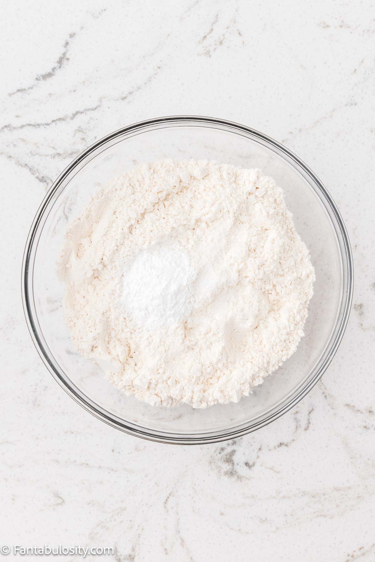 Flour, baking powder and salt in mixing bowl.
