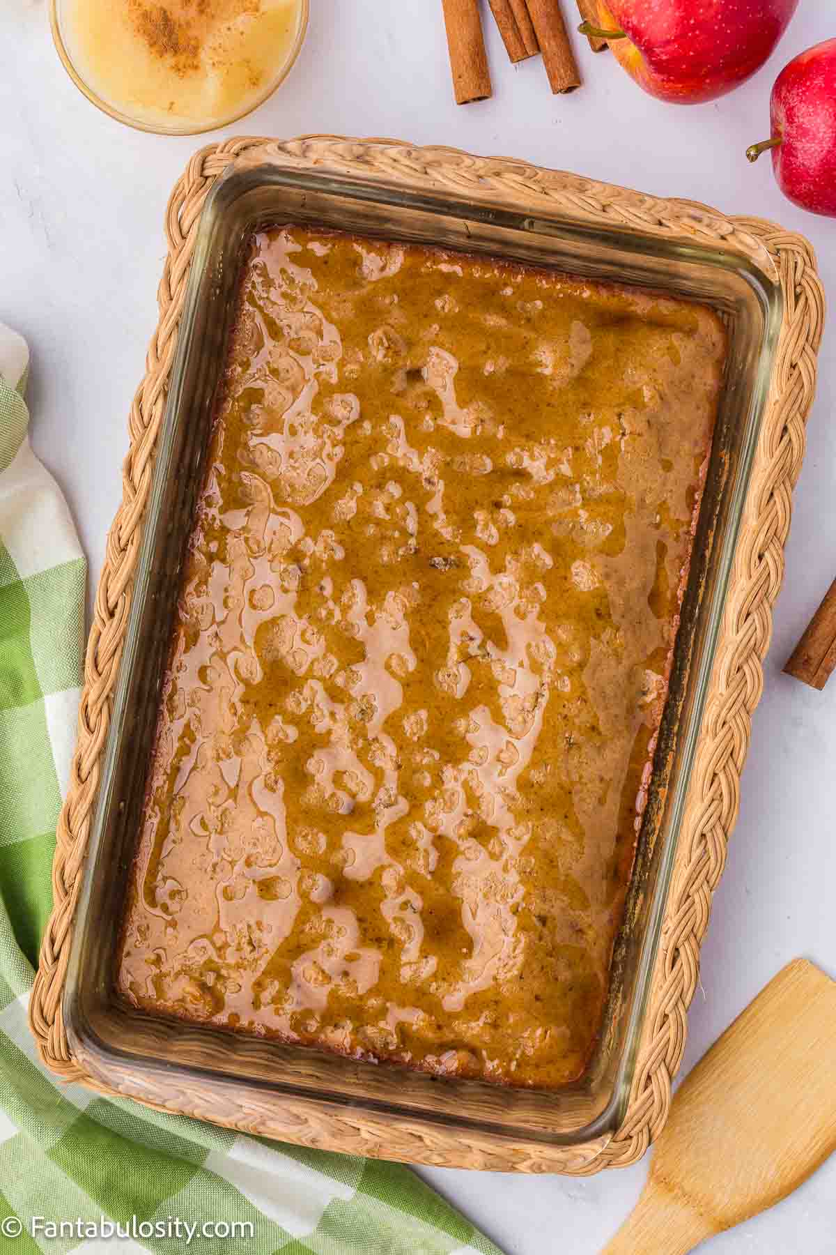 Baked amish applesauce cake in baking dish.