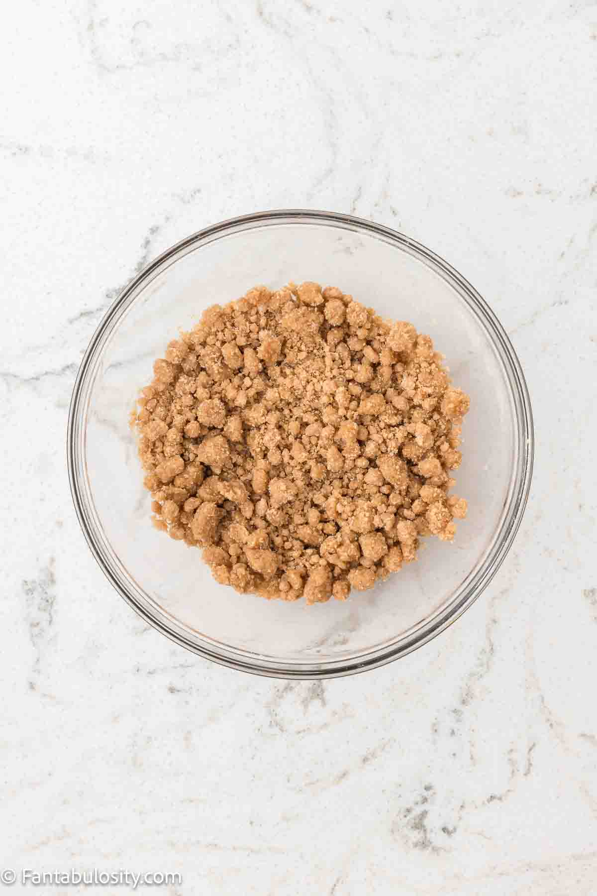 Crumb topping mixture in mixing bowl.