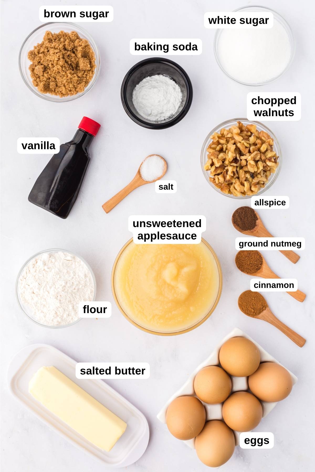 Labeled ingredients for Amish applesauce cake on a counter.