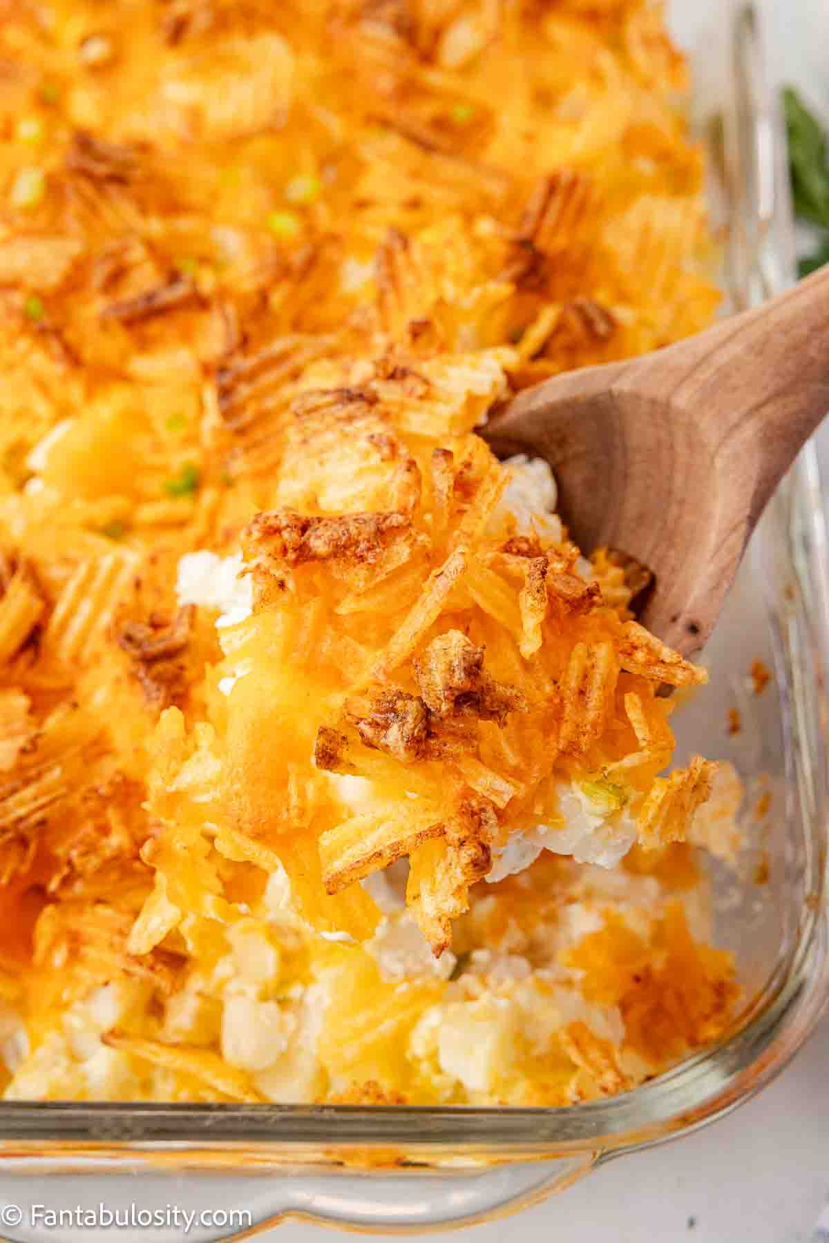 9x13 baking dish with party potatoes baked inside.