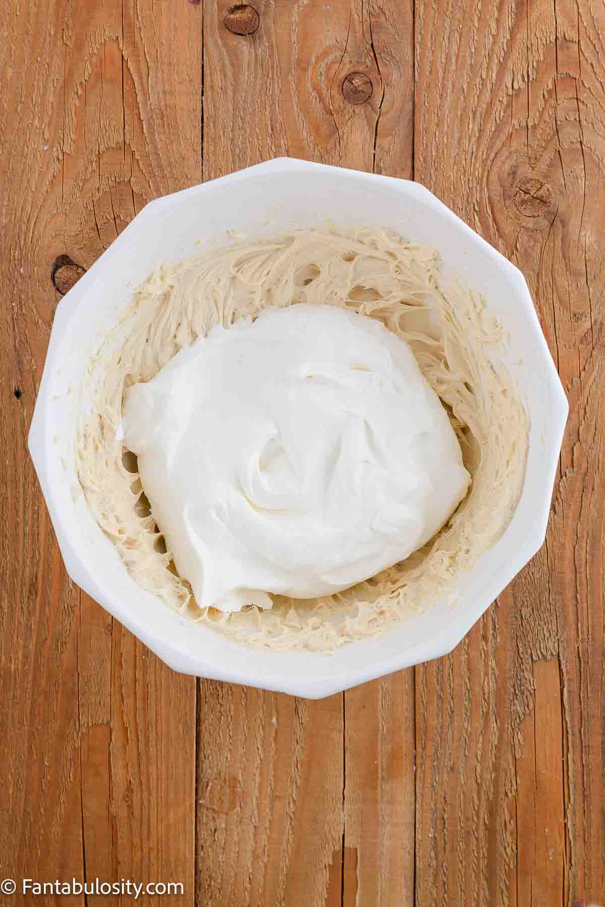 Cool Whip added to other pie ingredients in mixing bowl.