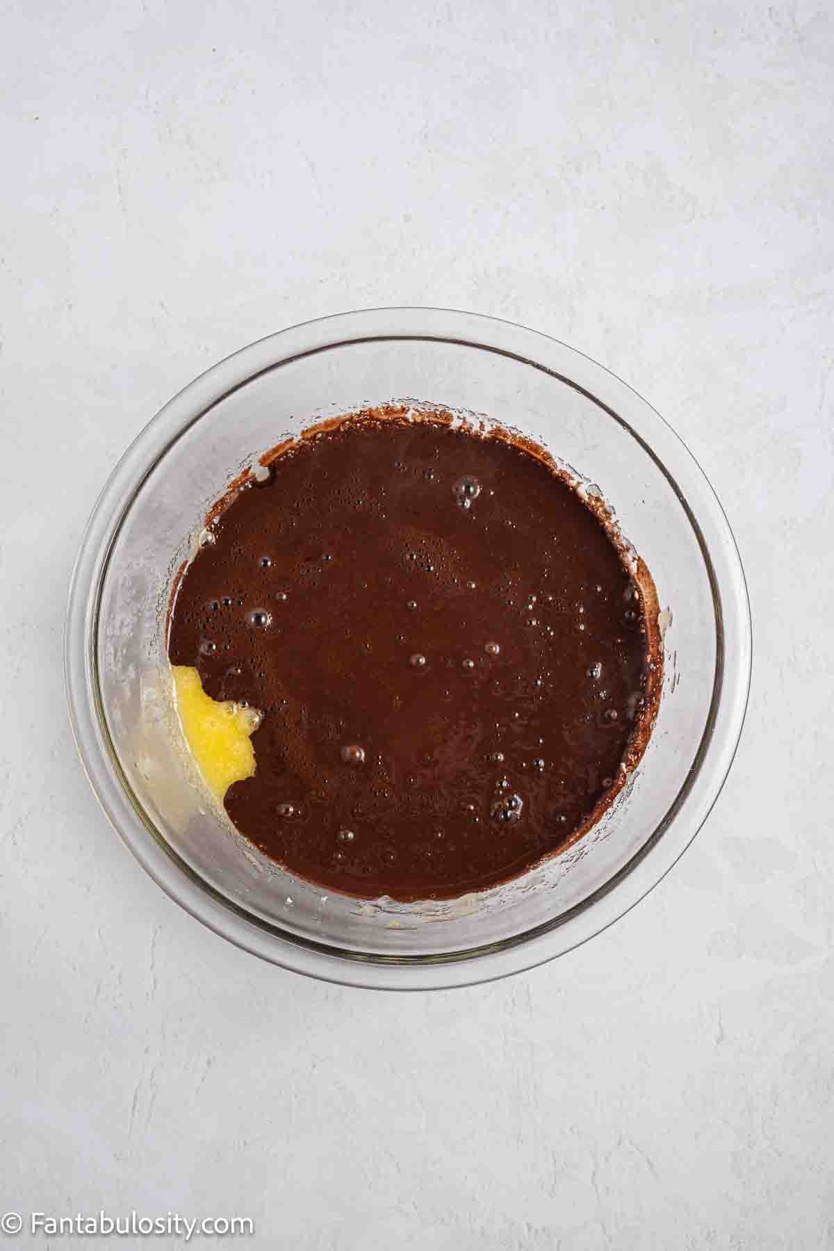 Cocoa powder in mixing bowl with other ingredients.