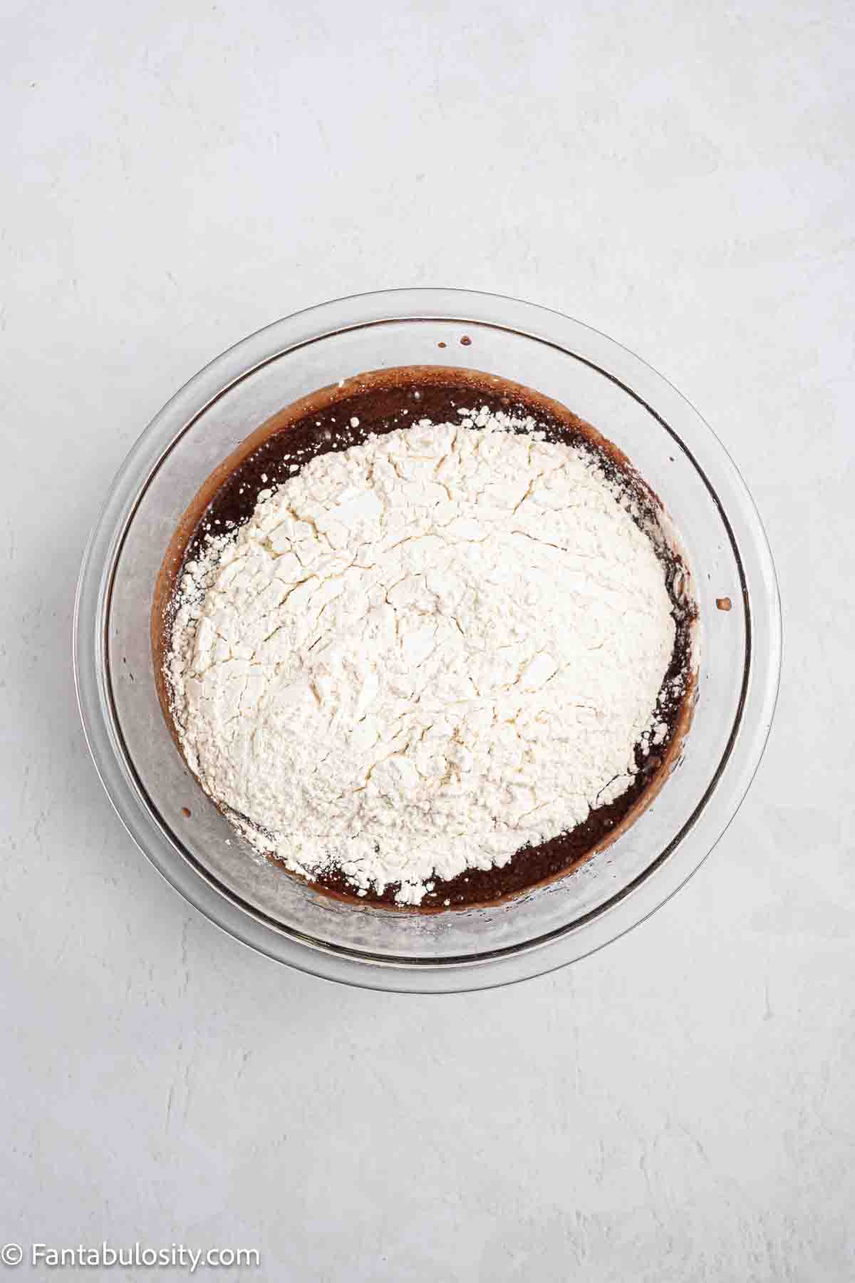 Dry ingredients added to wet ingredients.