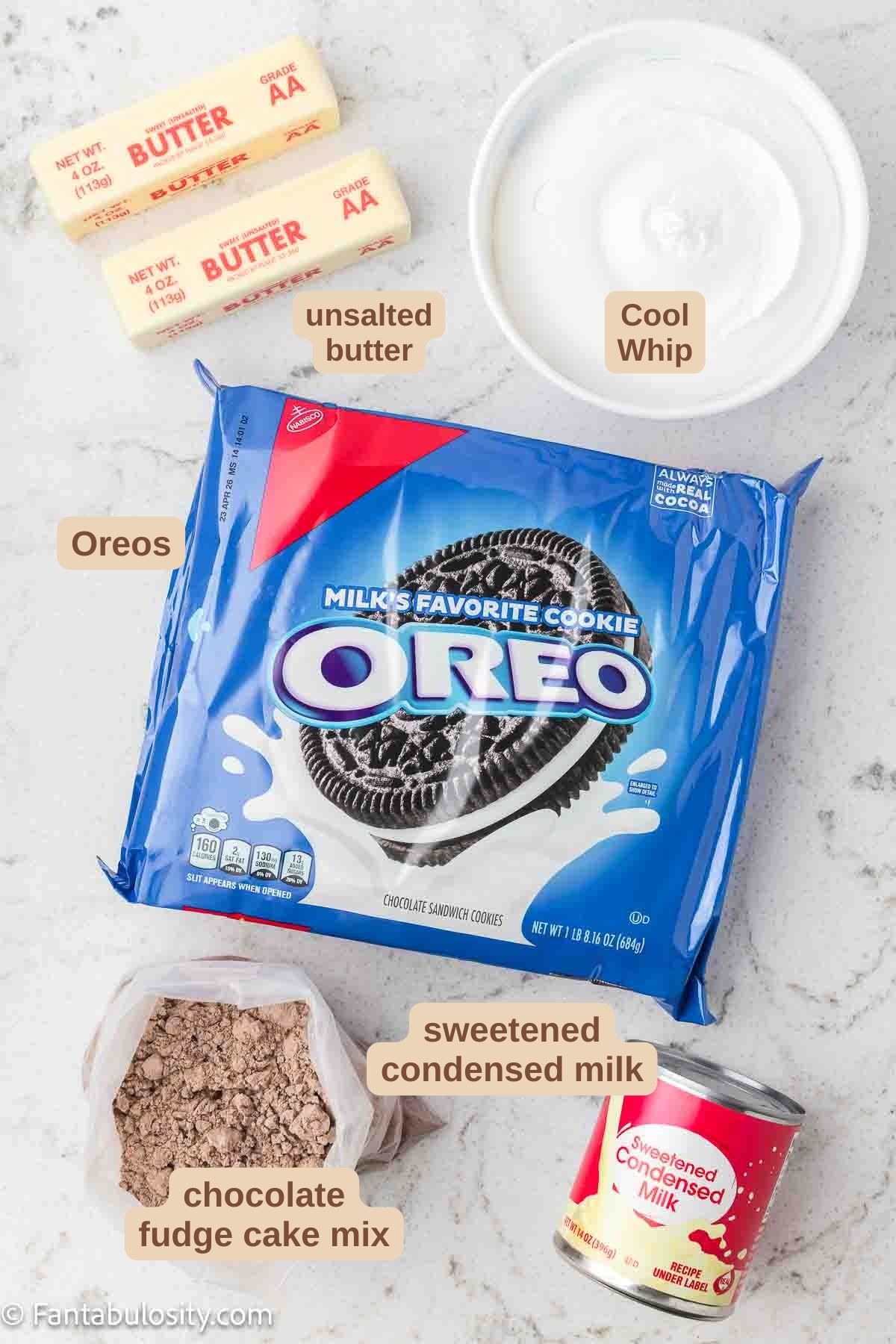 Ingredients for Oreo dump cake recipe sitting on counter.