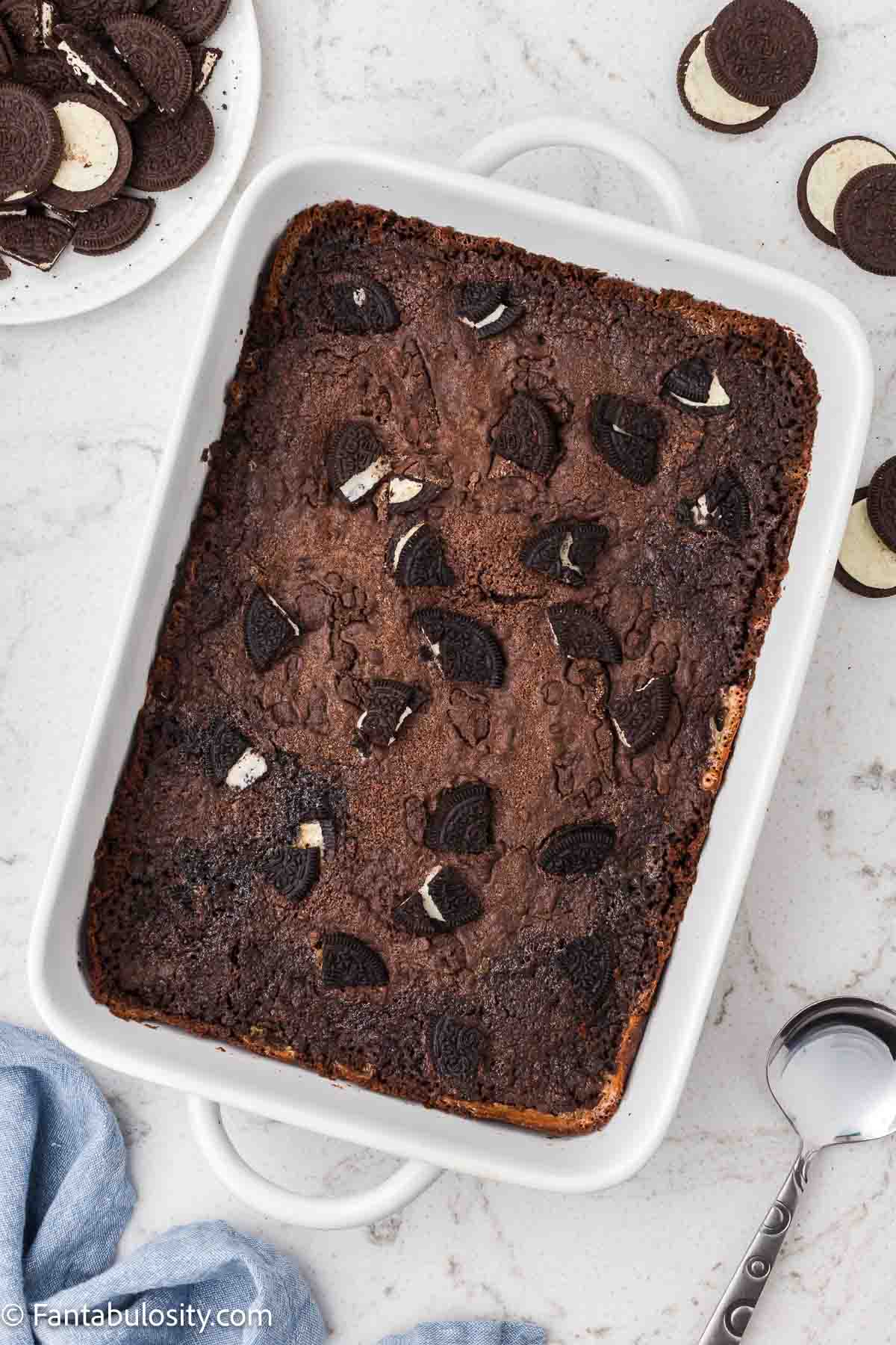 Baked Oreo dump cake in 9x13 baking dish.