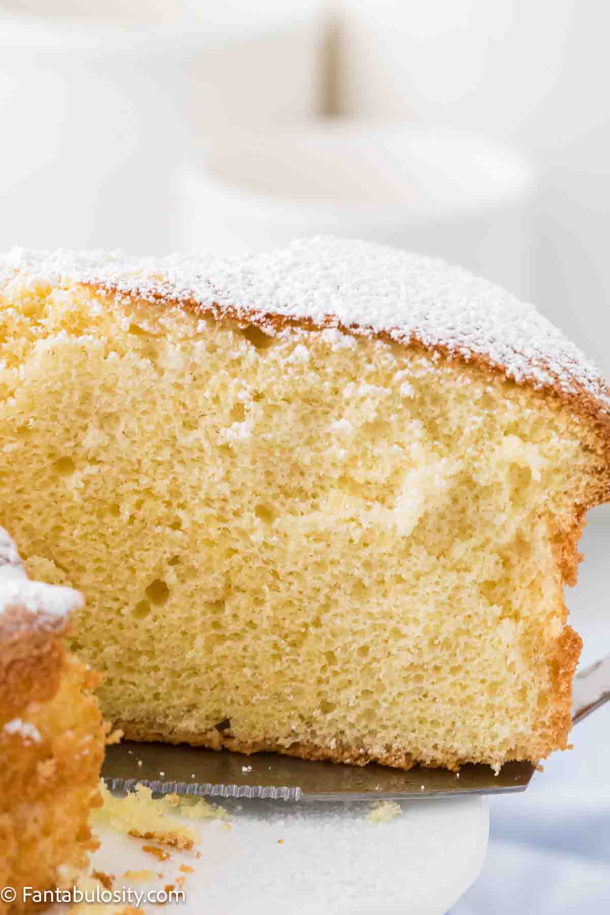A slice of cloud cake on a plate.