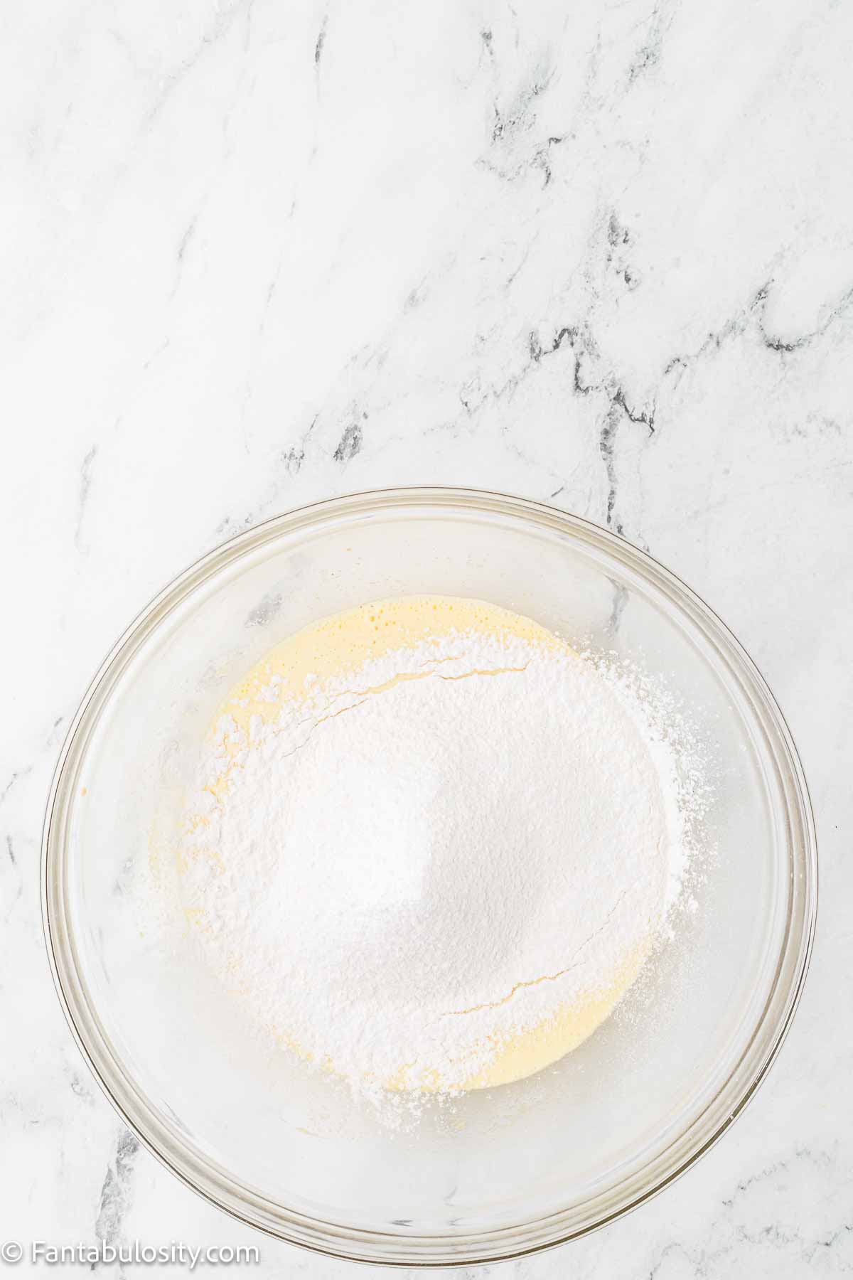 Dry ingredients mixed in to egg and sugar mixture.