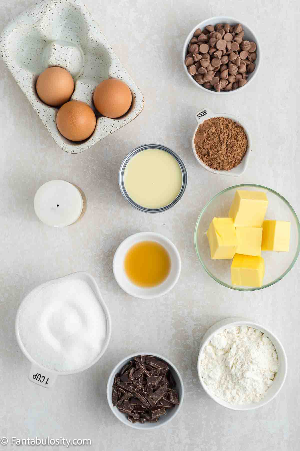 Ingredients to make condensed milk brownies sitting on kitchen counter.