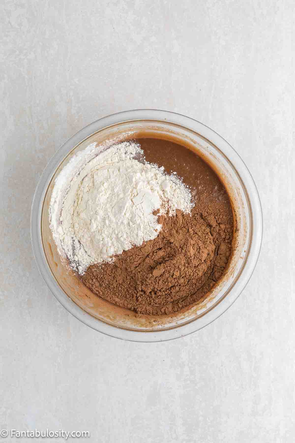 Flour and cocoa added to mixing bowl.