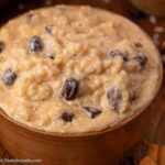 Crock Pot rice pudding in small bowl.