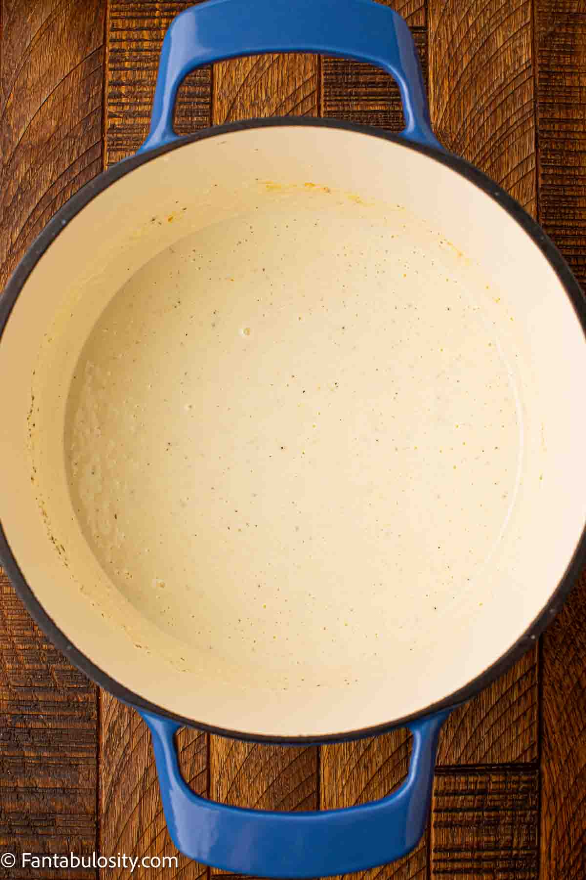 Milk and heavy cream added to butter and flour mixture.