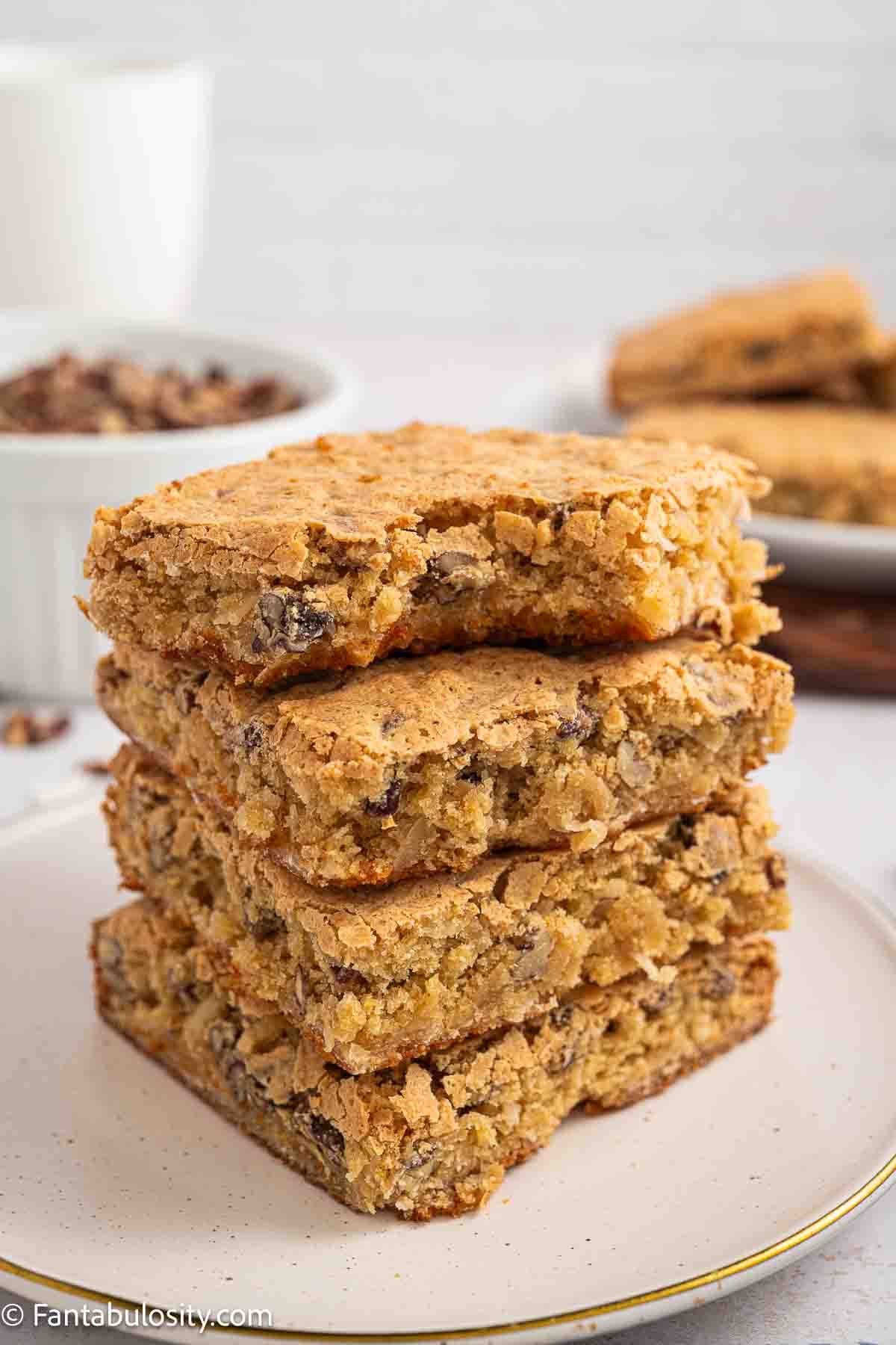 Stack of sad cake on a plate.