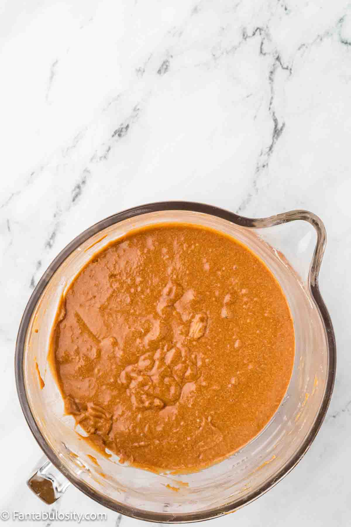 Dry ingredients added to butter and sugar.