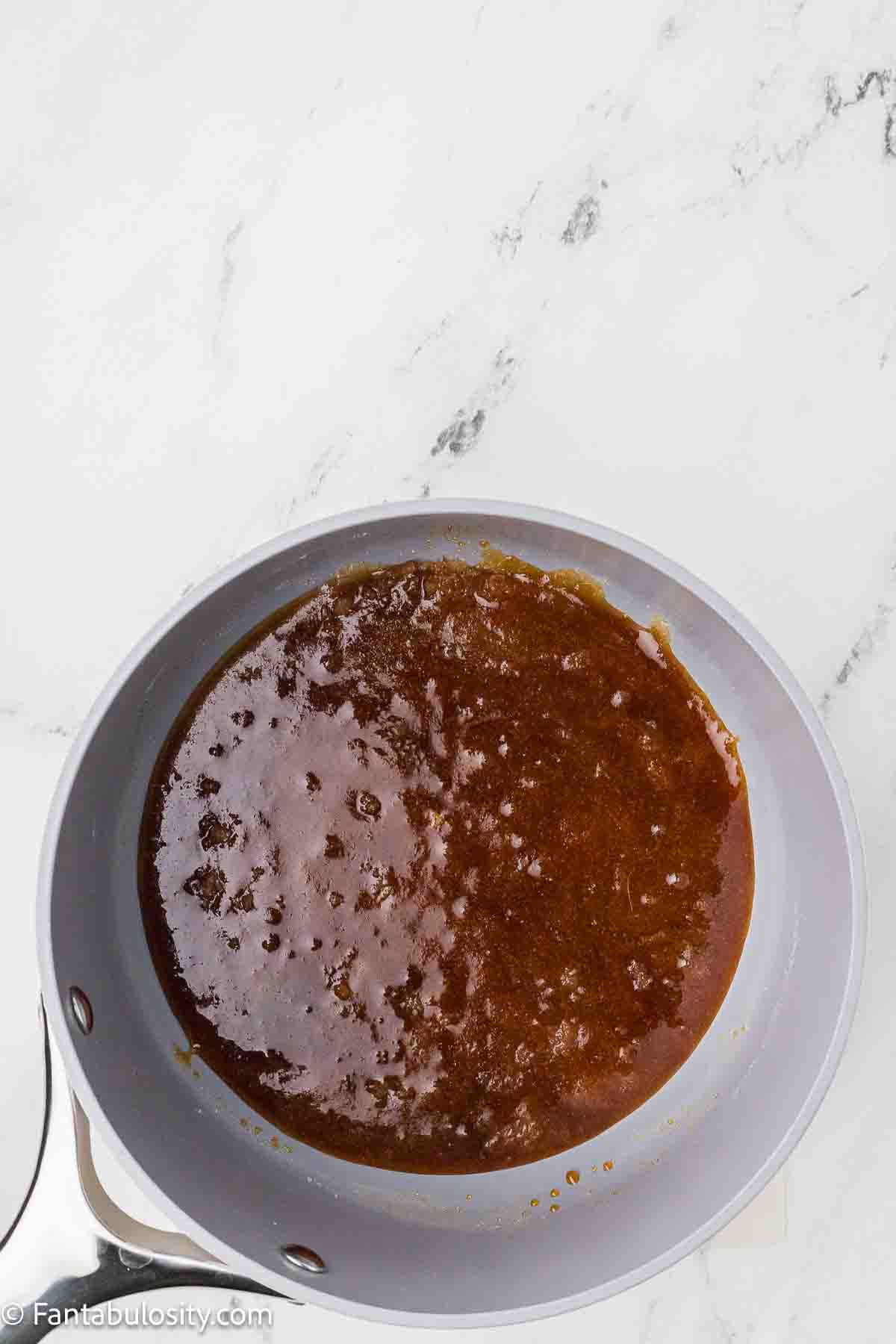 Sugar burnt in saucepan.