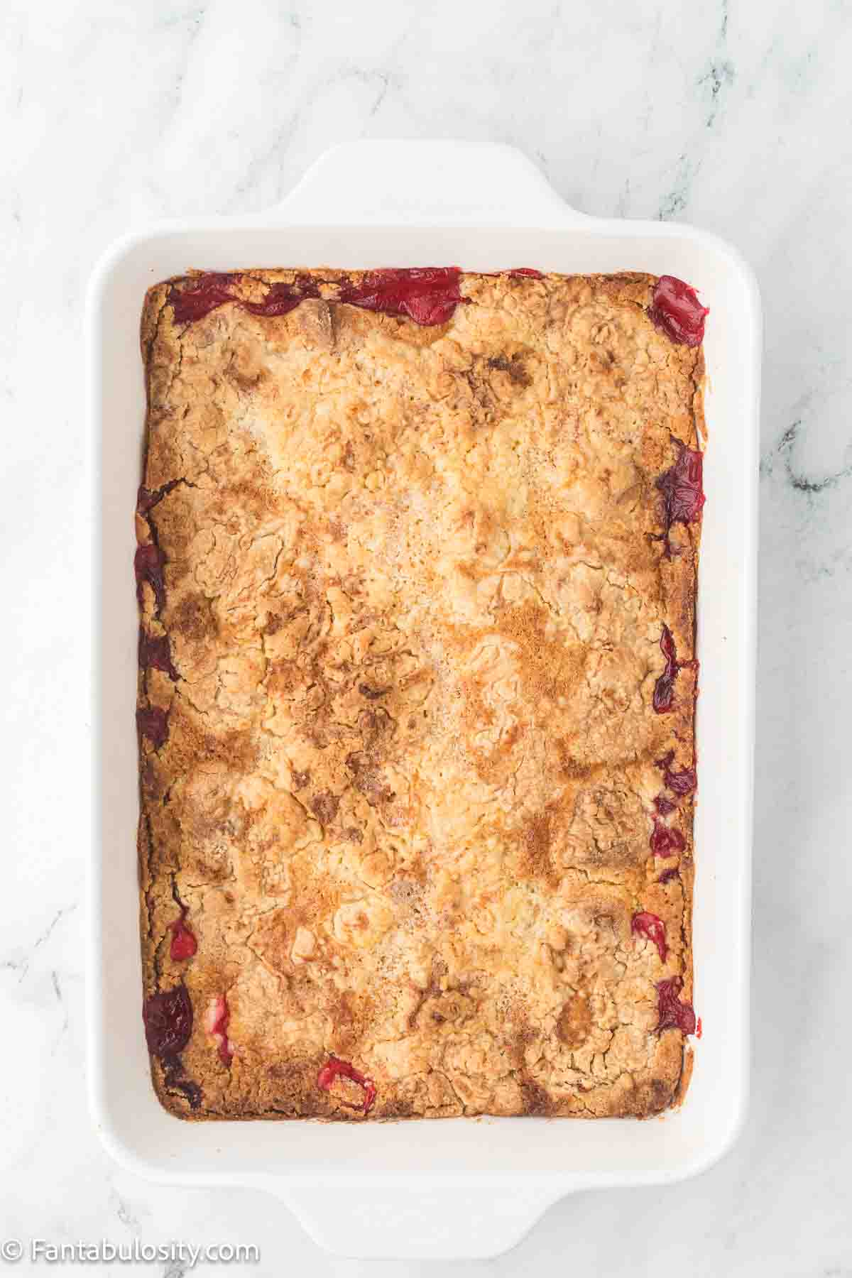 Baked strawberry cream cheese dump cake.