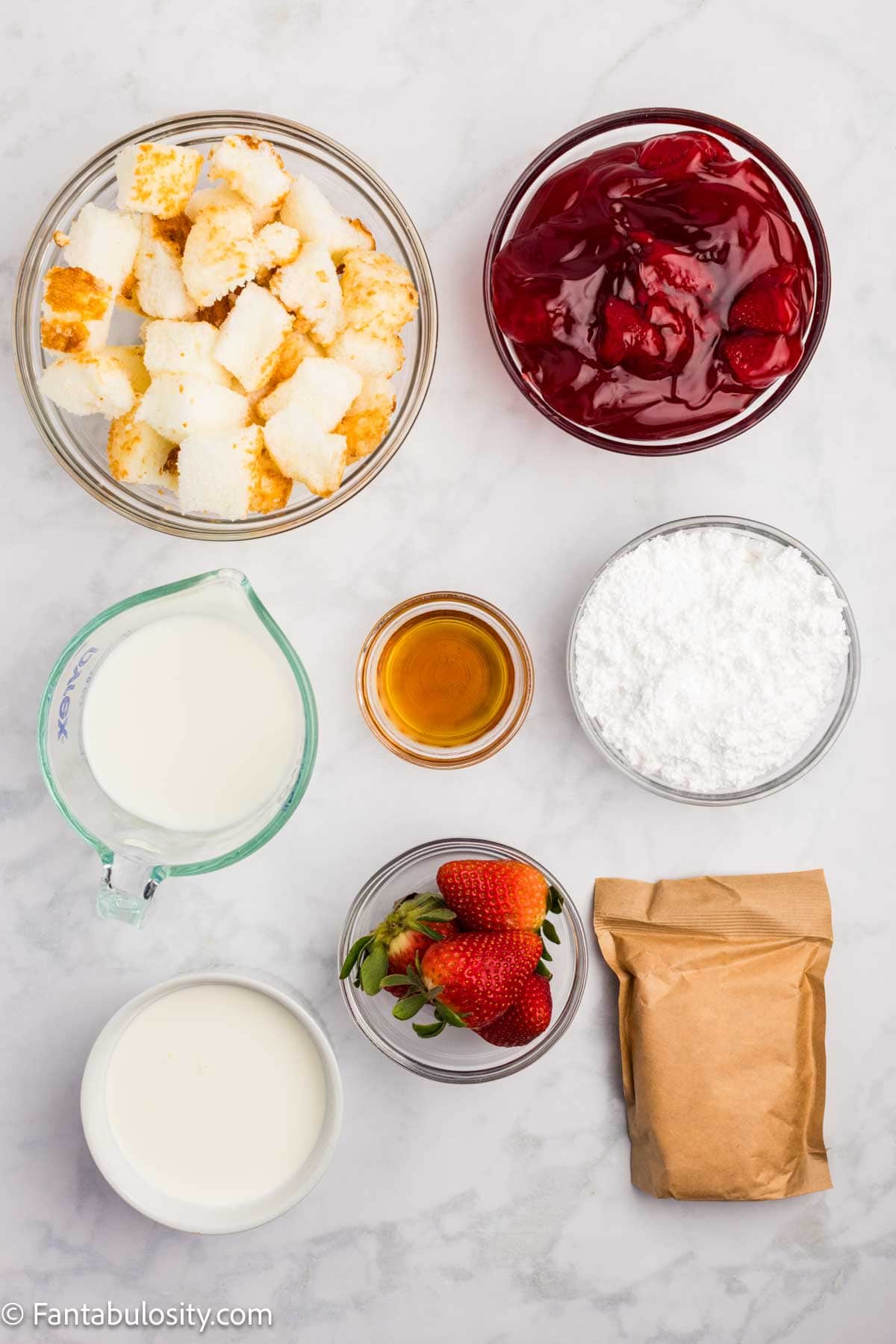 Ingredients to make strawberry heaven, sitting on counter.