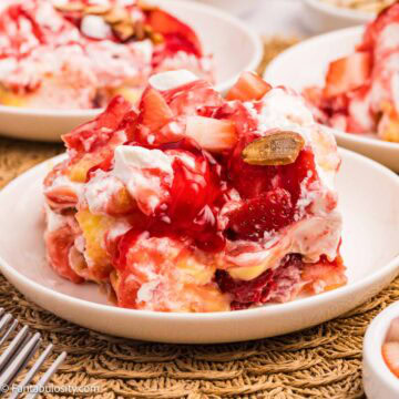 A slice of strawberry heaven cake dessert on a plate.