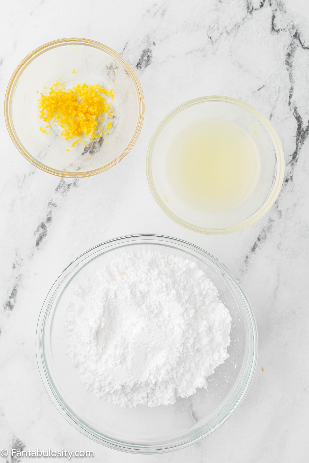 Powdered sugar, lemon juice and lemon zest.