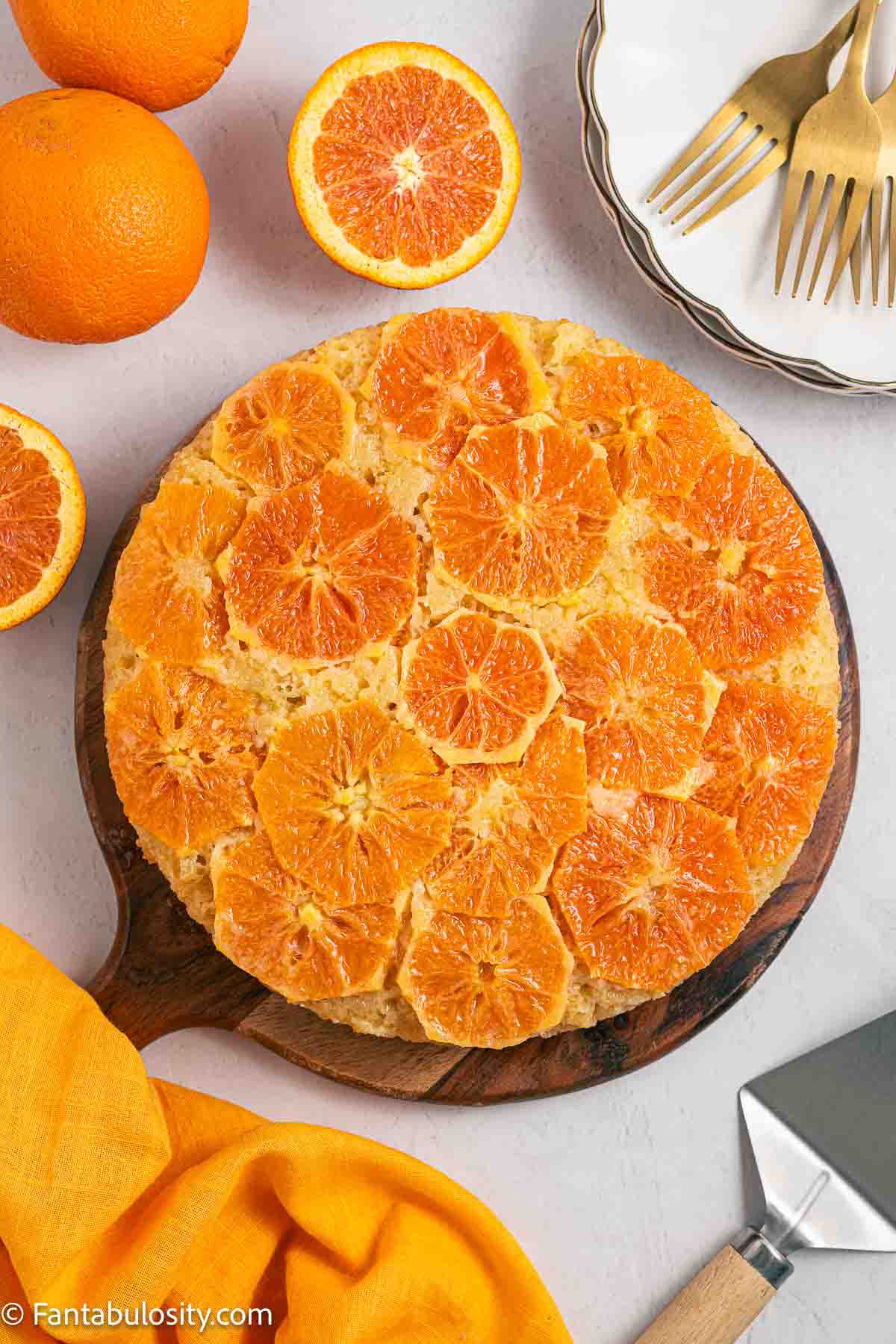 Round, orange upside down cake.