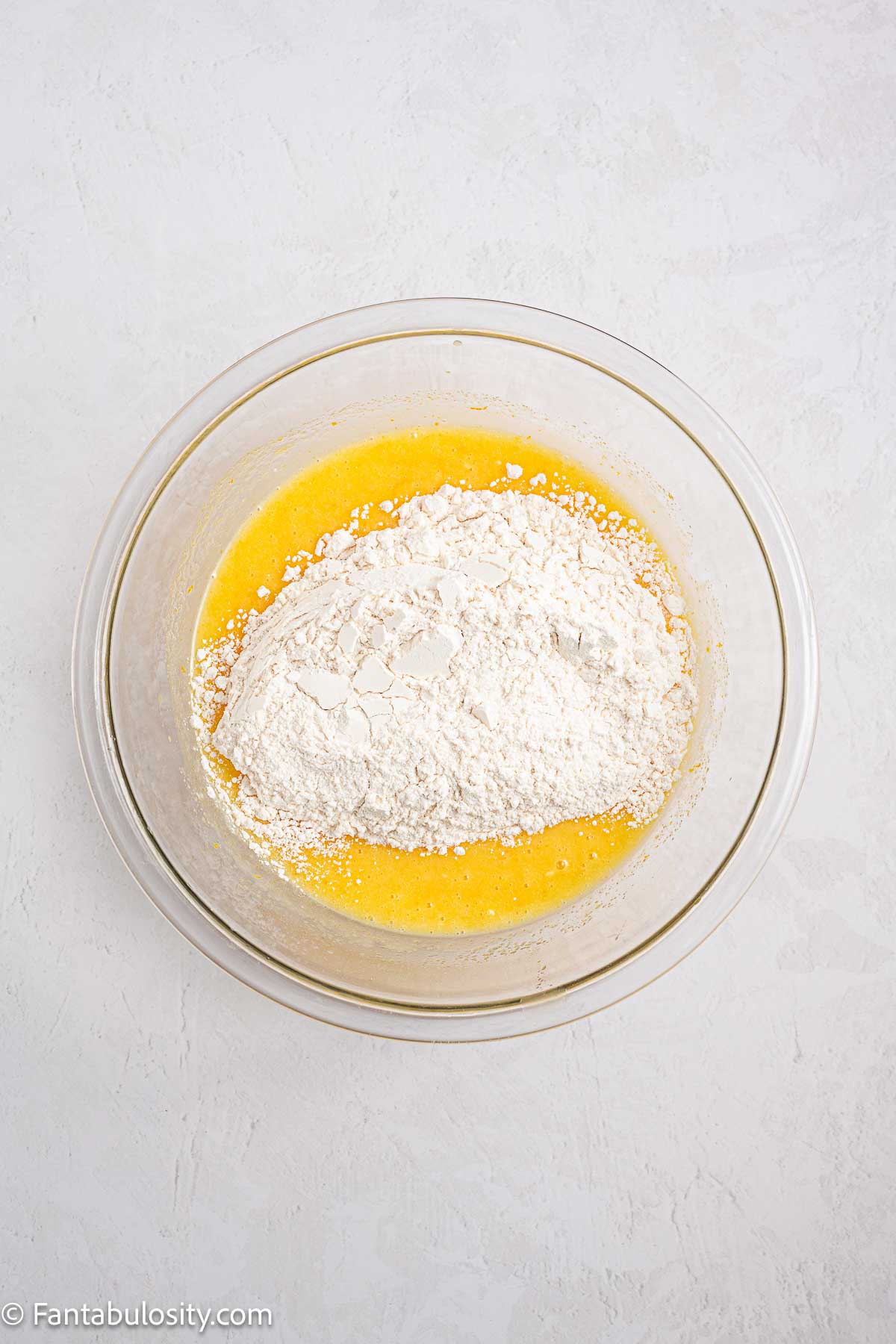 Dry ingredients added to wet ingredients.