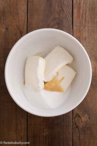 Cream cheese, vanilla, sugar in mixing bowl.