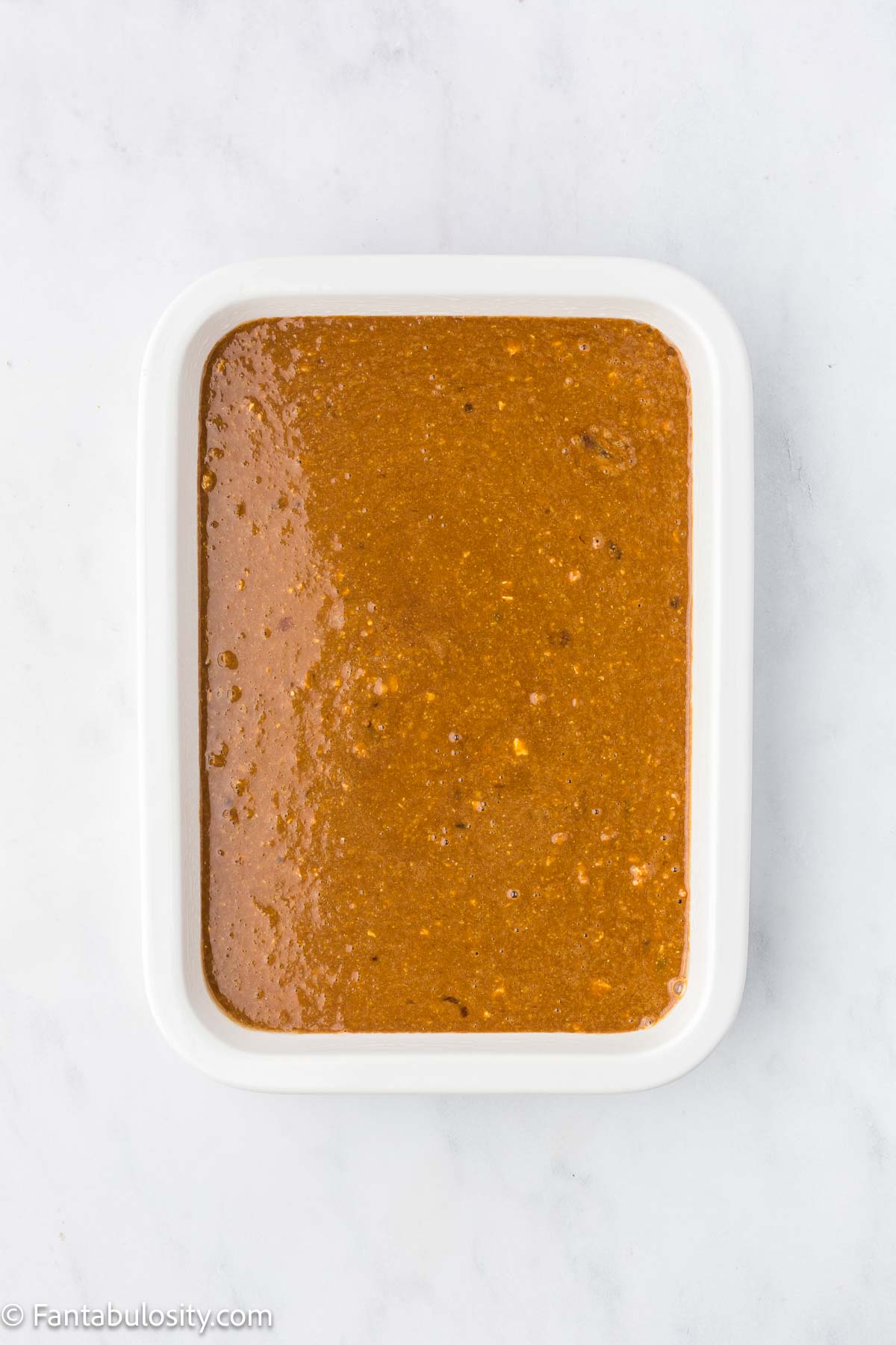 Shoofly cake batter poured in to 9x13 baking pan.