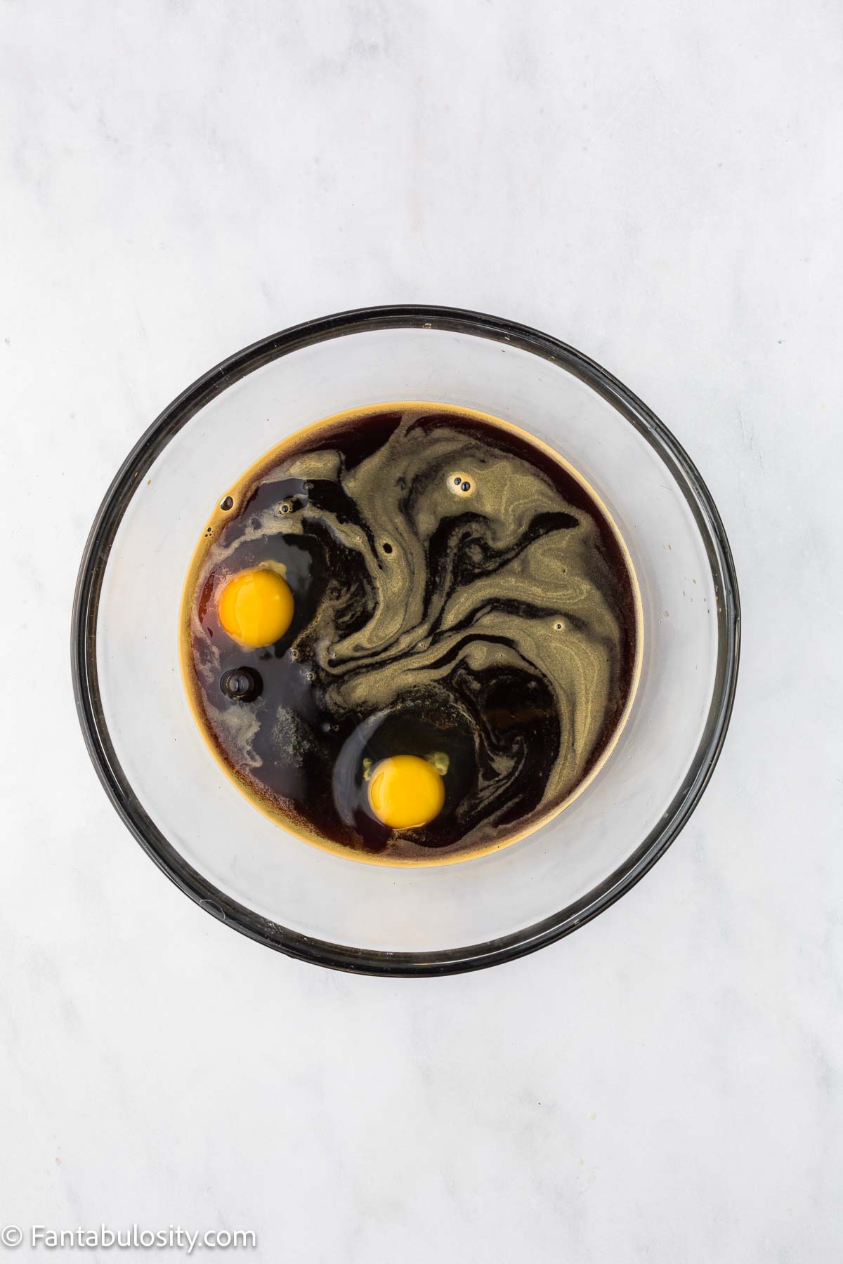 Molasses, eggs, baking soda and salt in mixing bowl.