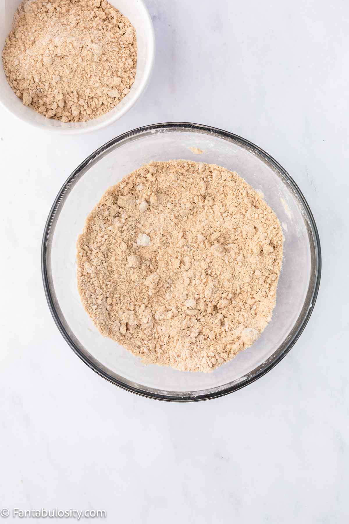 Dry mixture with softened butter, in mixing bowl.