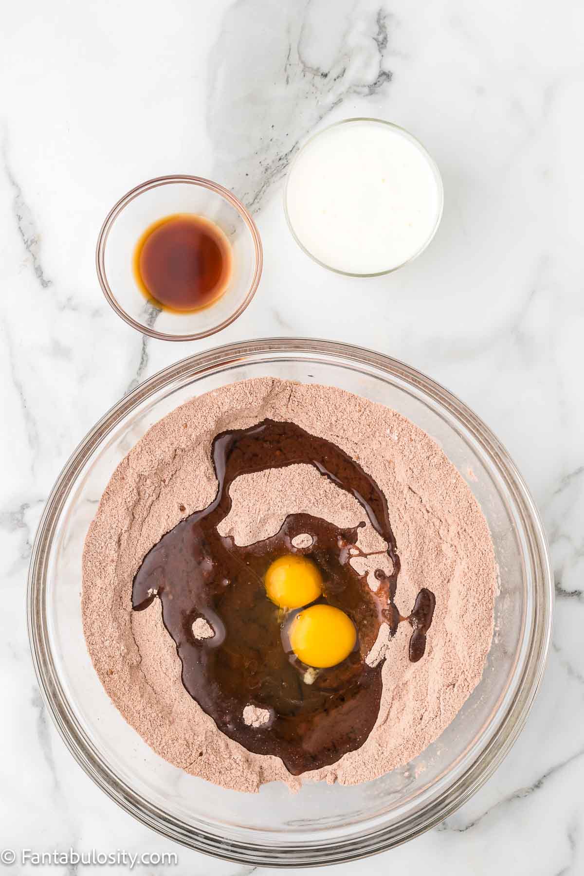 eggs, oil, buttermilk, and vanilla added to chocolate cake batter for Westhaven Cake