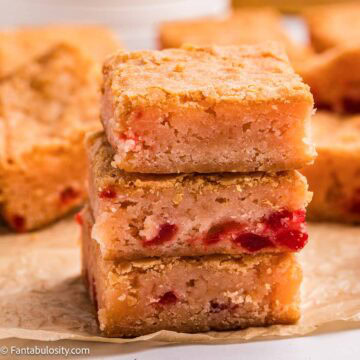 Cherry Blondies stacked on top of one another.