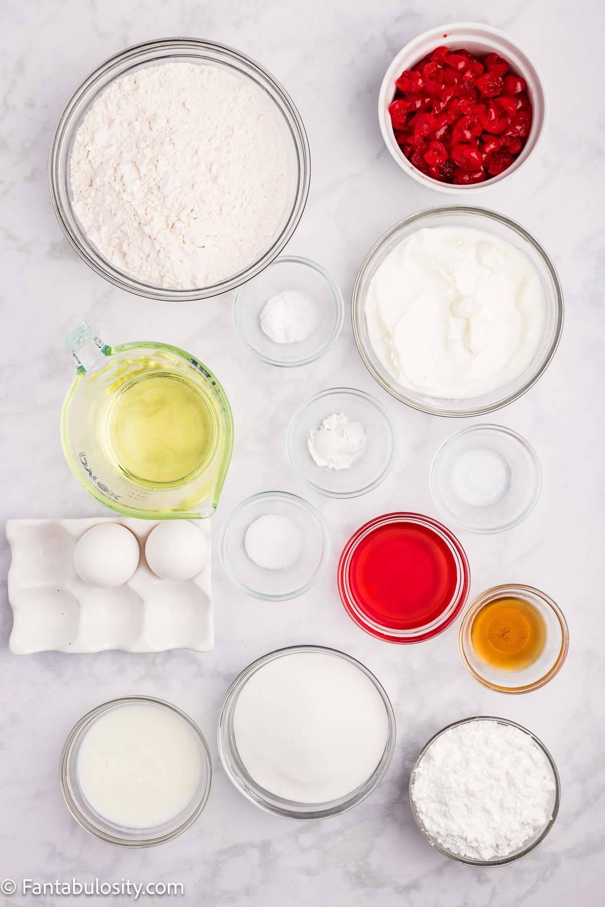 Ingredients to make cherry bread, sitting on counter.