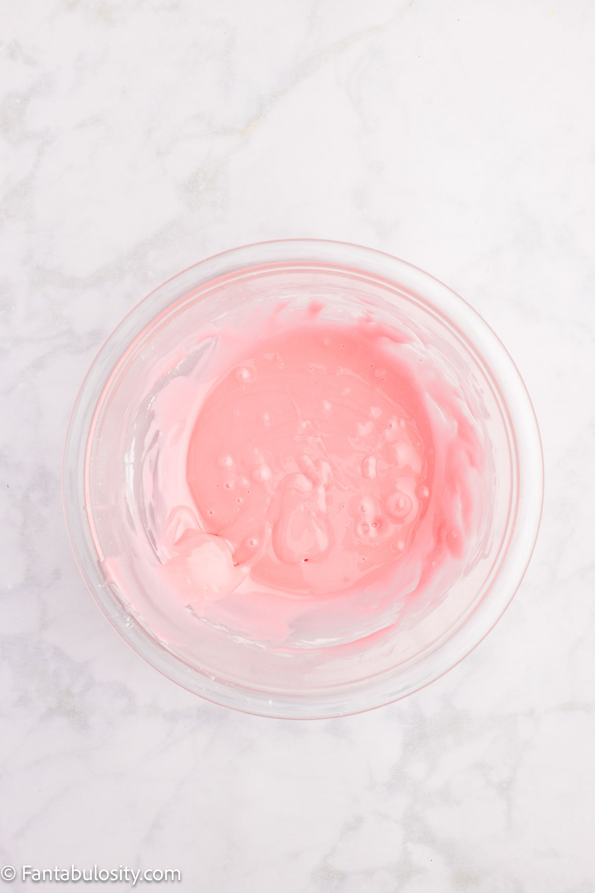 Cherry juice glaze in mixing bowl.