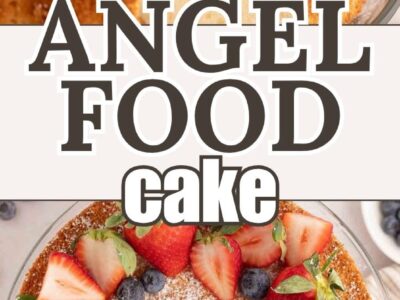 Angel Food Cake with fruit and powdered sugar sprinkled on top.