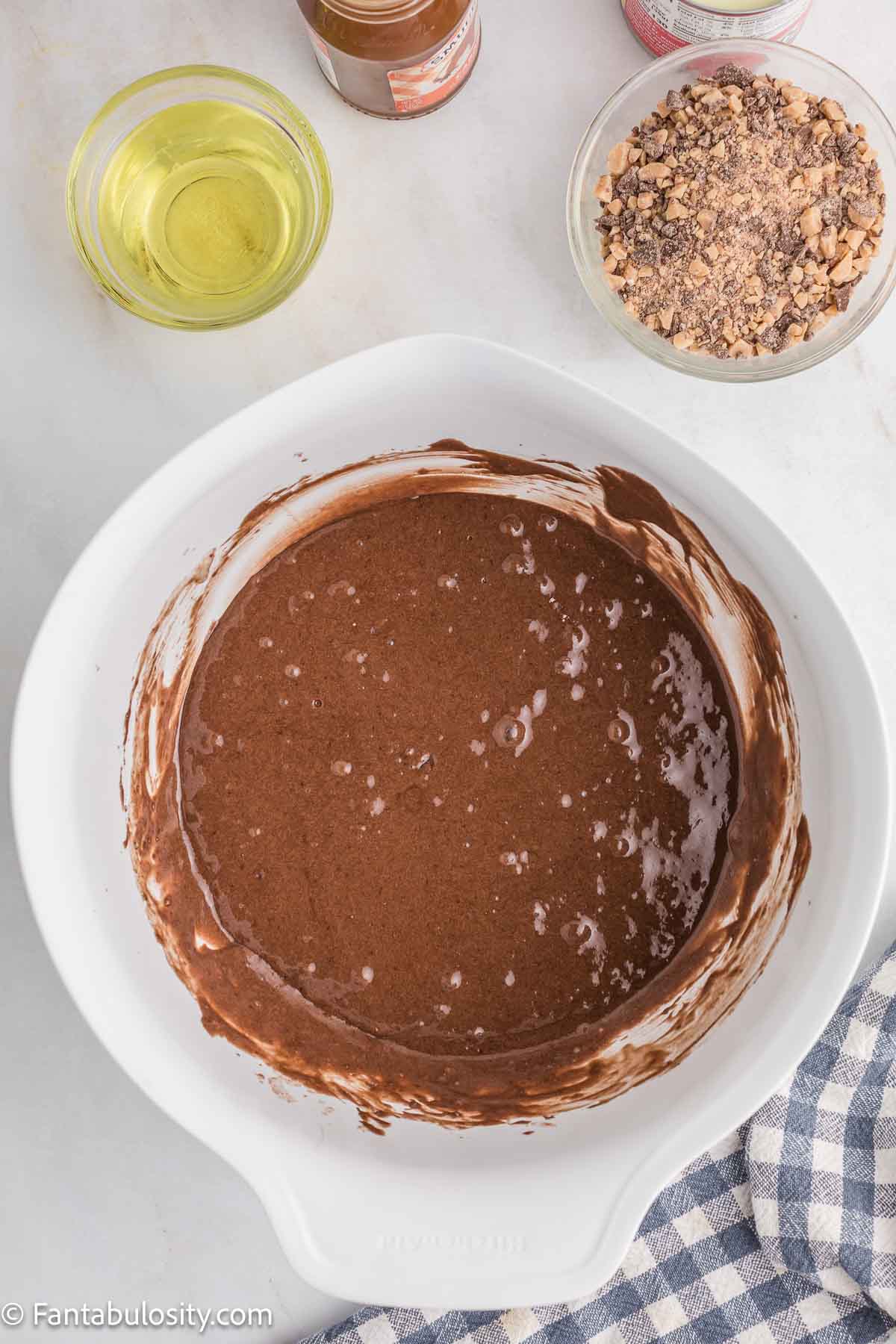 Chocolate cake mix batter in mixing bowl.