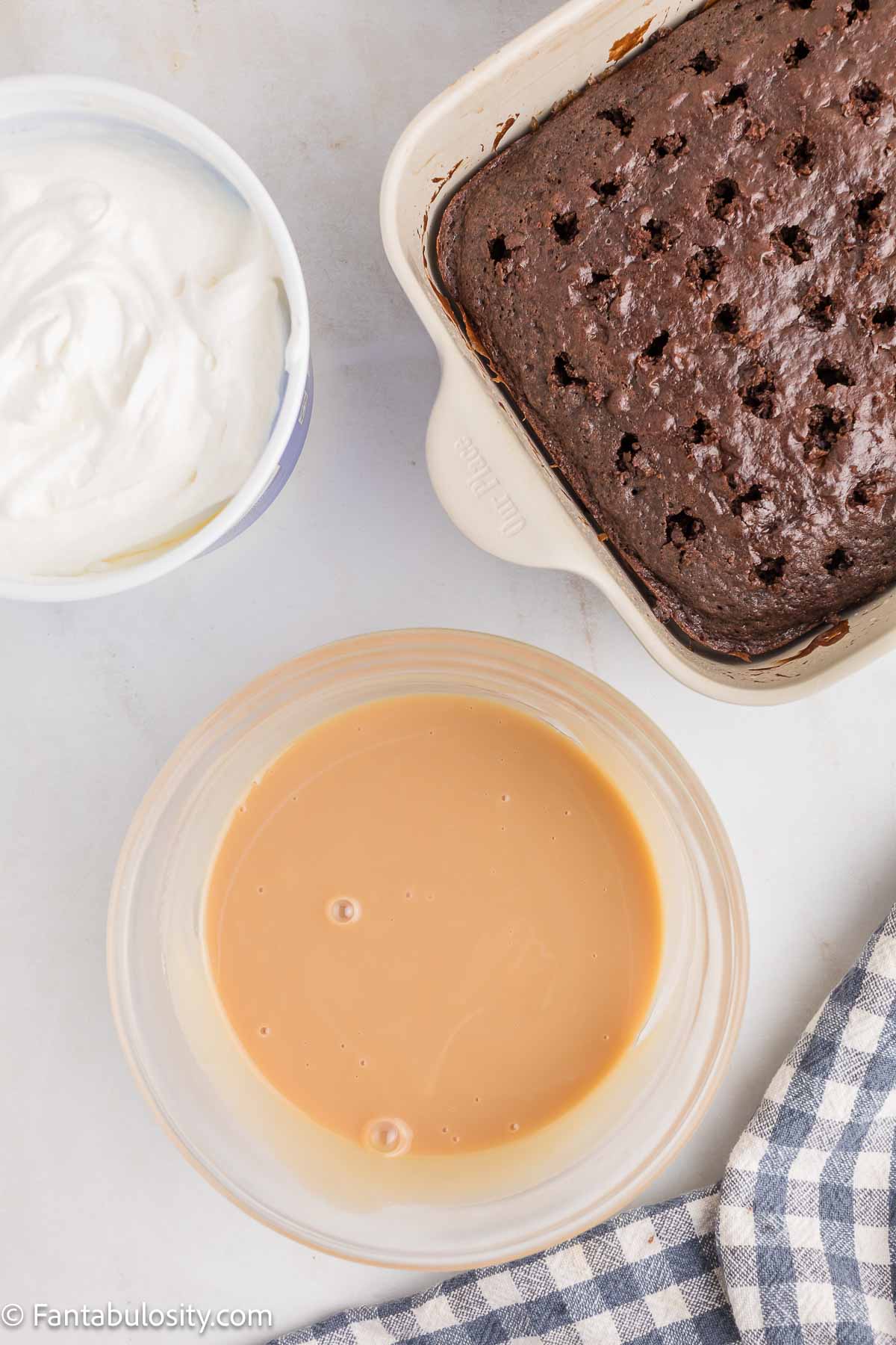 Caramel sweetened condensed milk mixture in mixing bowl.