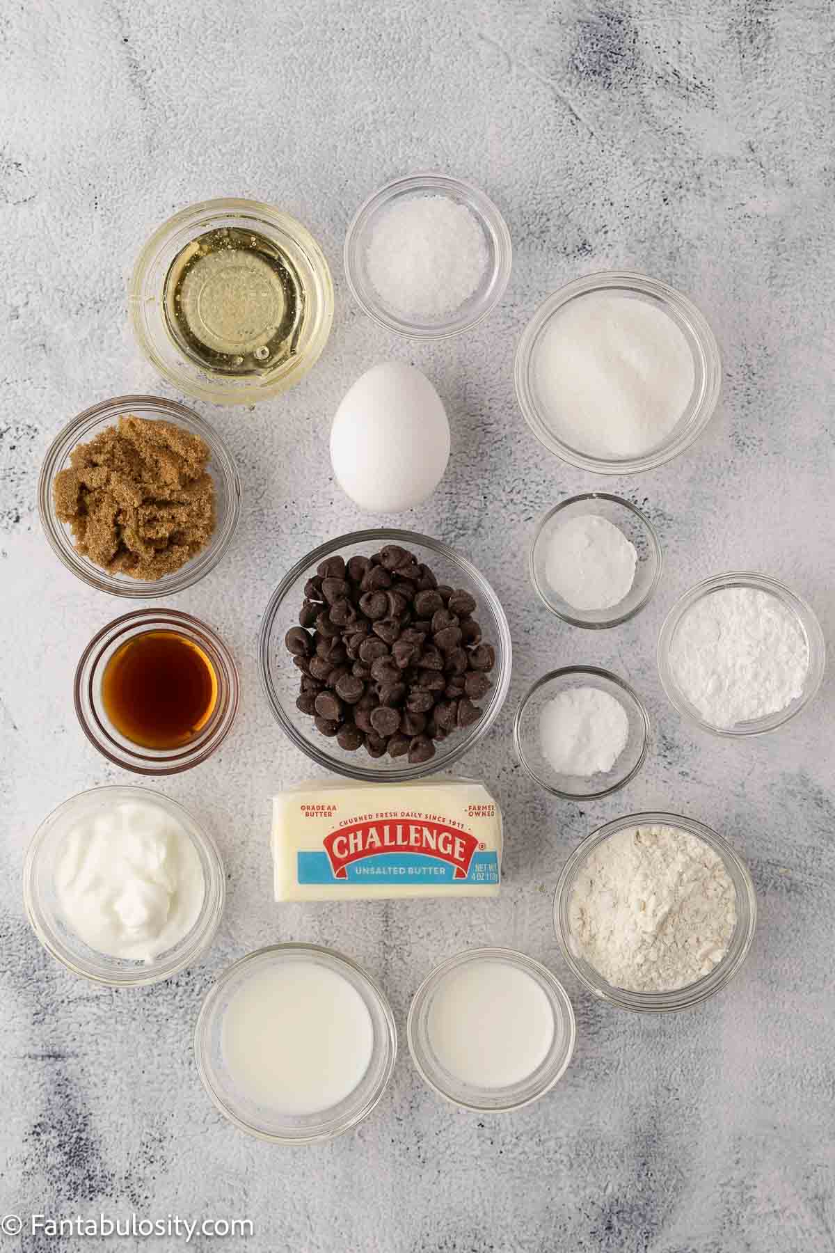 Ingredients for chocolate chip cake recipe on counter.