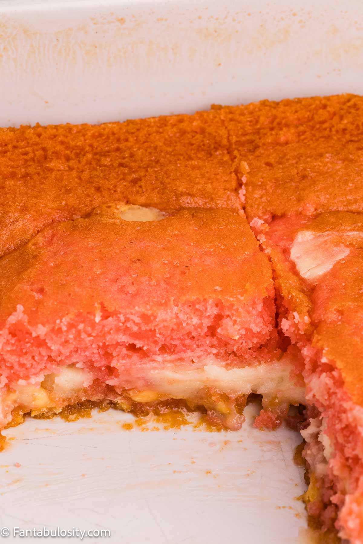 Showing inside of earthquake cake, and cream cheese layers.