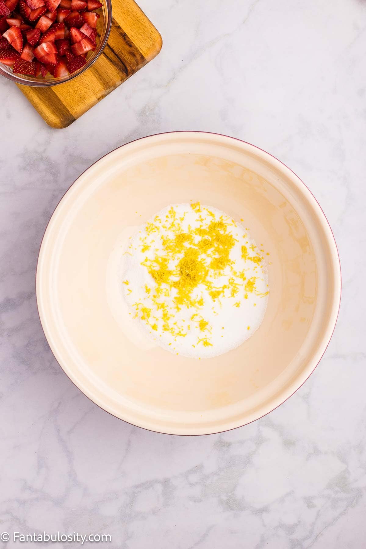 Lemon zest mixed in to the dry ingredients in mixing bowl.