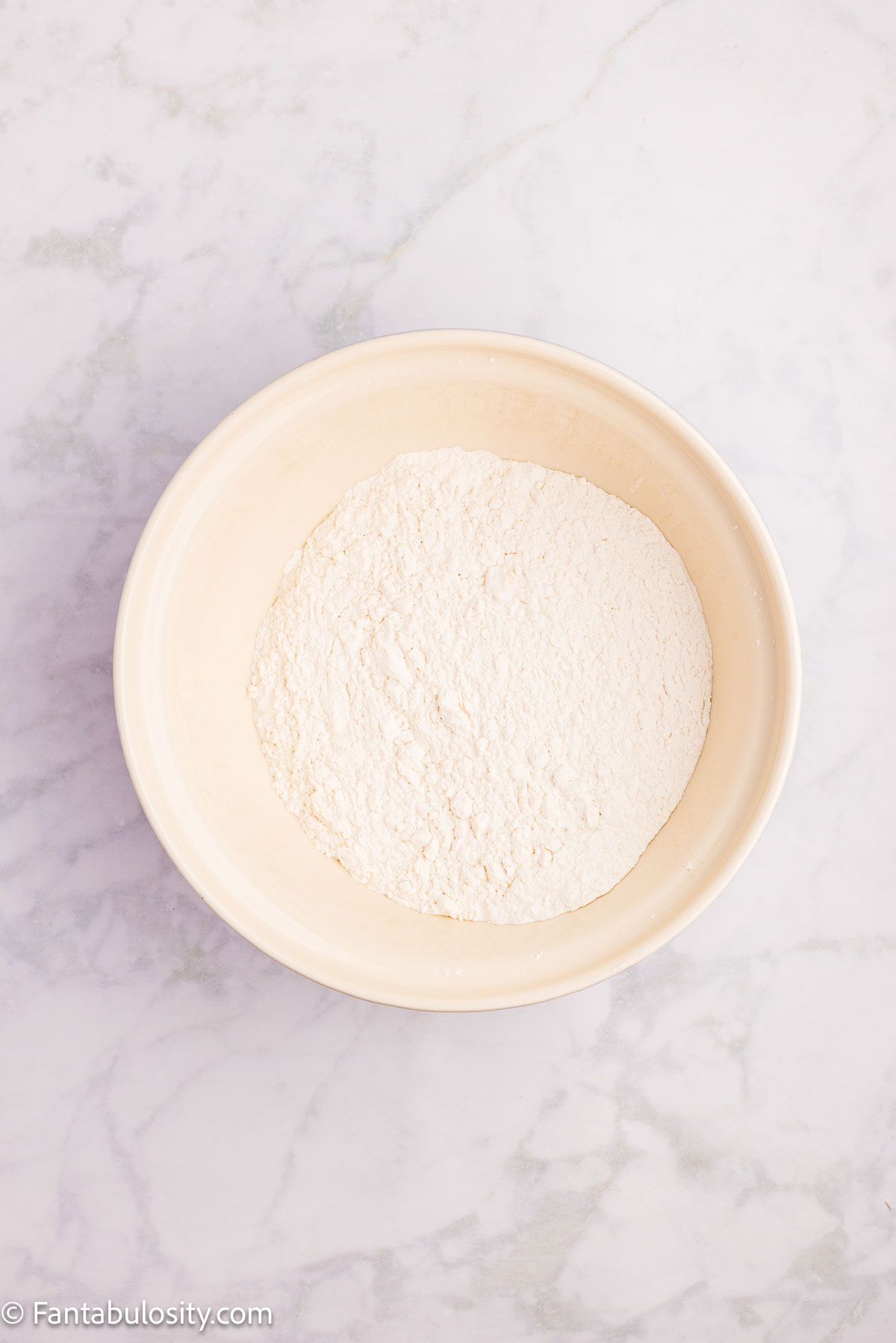 Flour, and dry ingredients in mixing bowl.