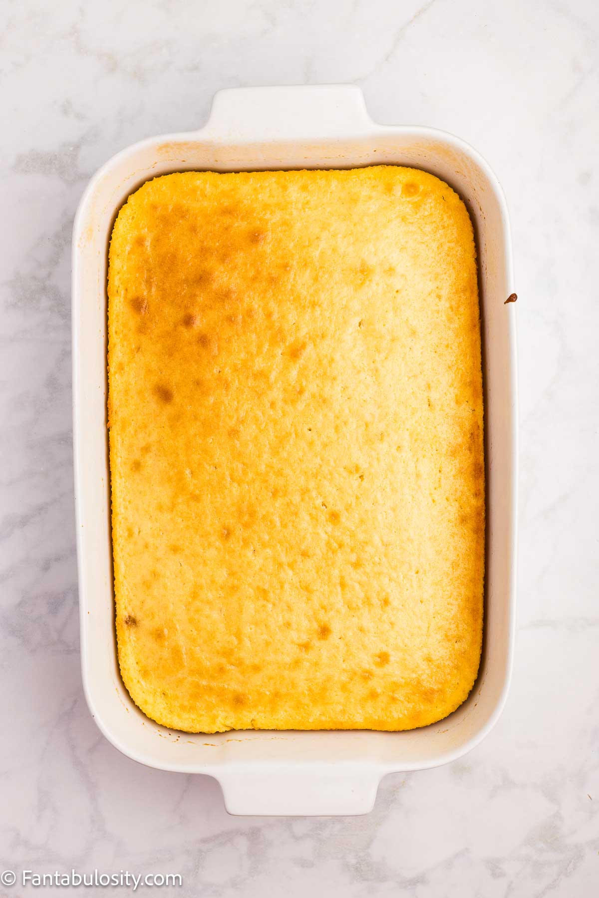 Baked strawberry shortcake in a 9x13 baking dish.