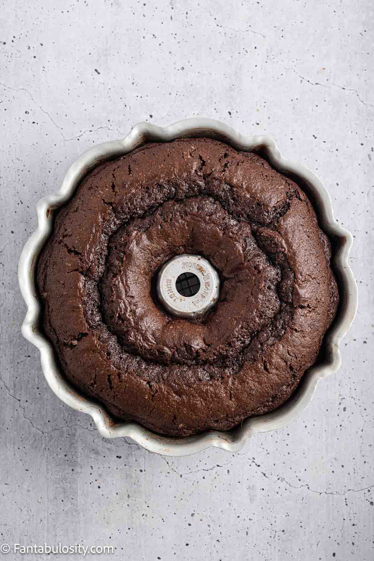 Baked brownie cake in bundt pan.