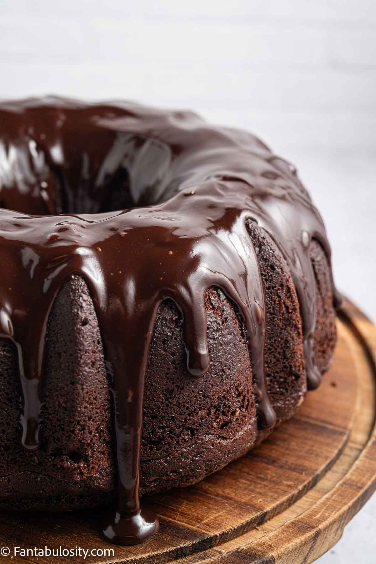 Chocolate ganache poured on top of brownie cake.