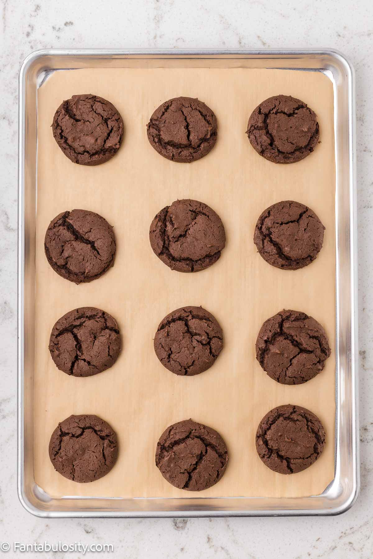 Baked Hostess Cupcake Cookies on baking sheet.