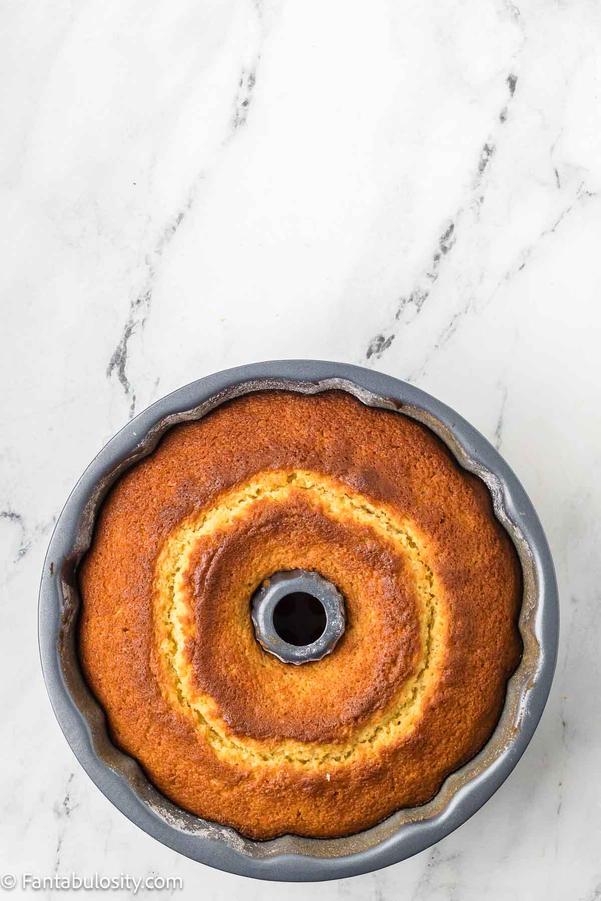 Baked orange juice cake in bundt pan.