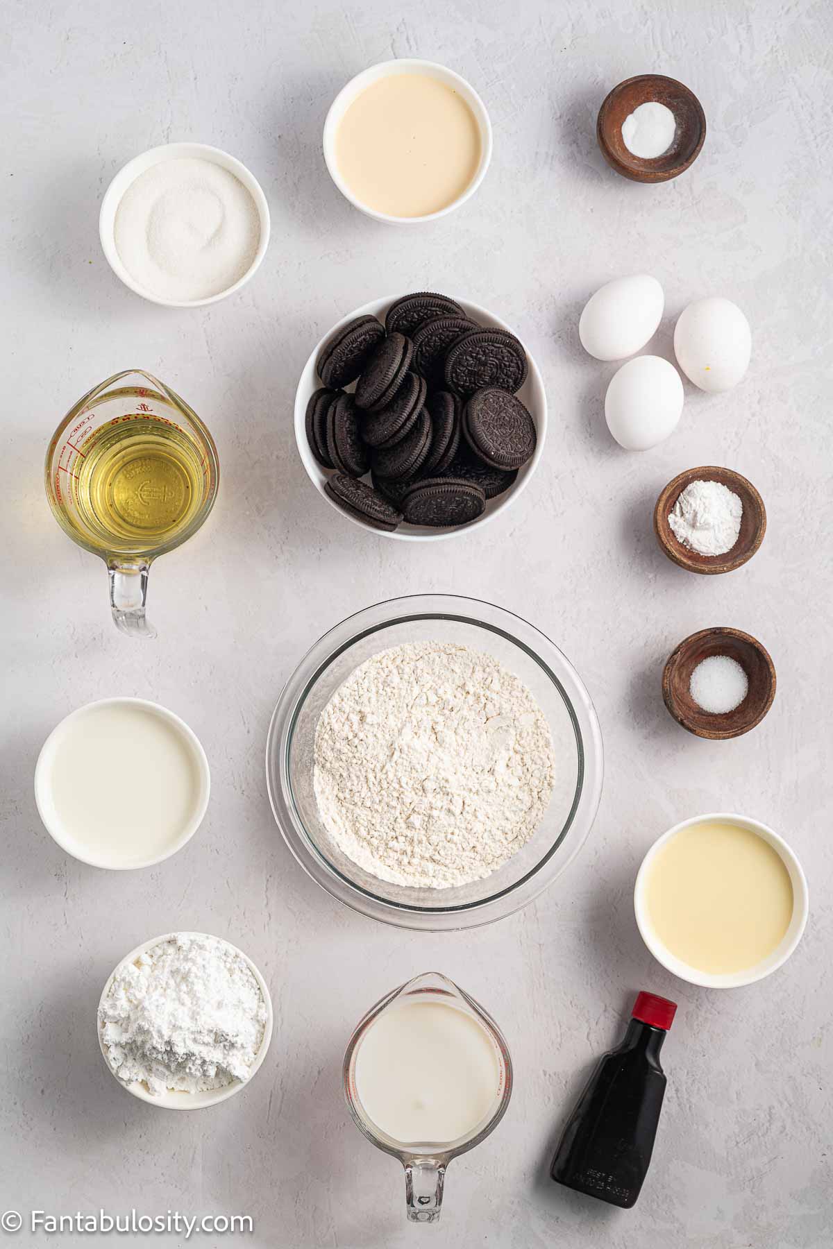 Ingredients to make Oreo Tres Leches cake, sitting on counter.