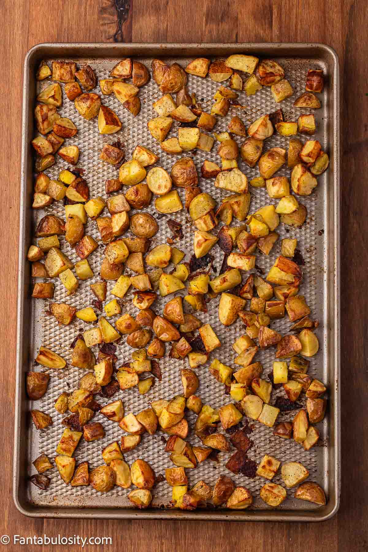 Roasted potatoes on a baking sheet. 