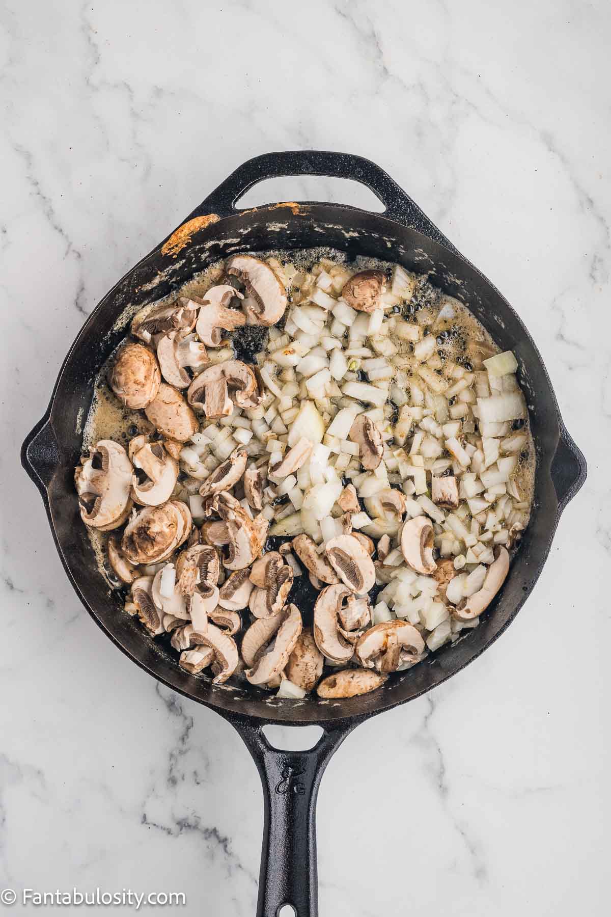 Onions, flour and spices added to skillet.